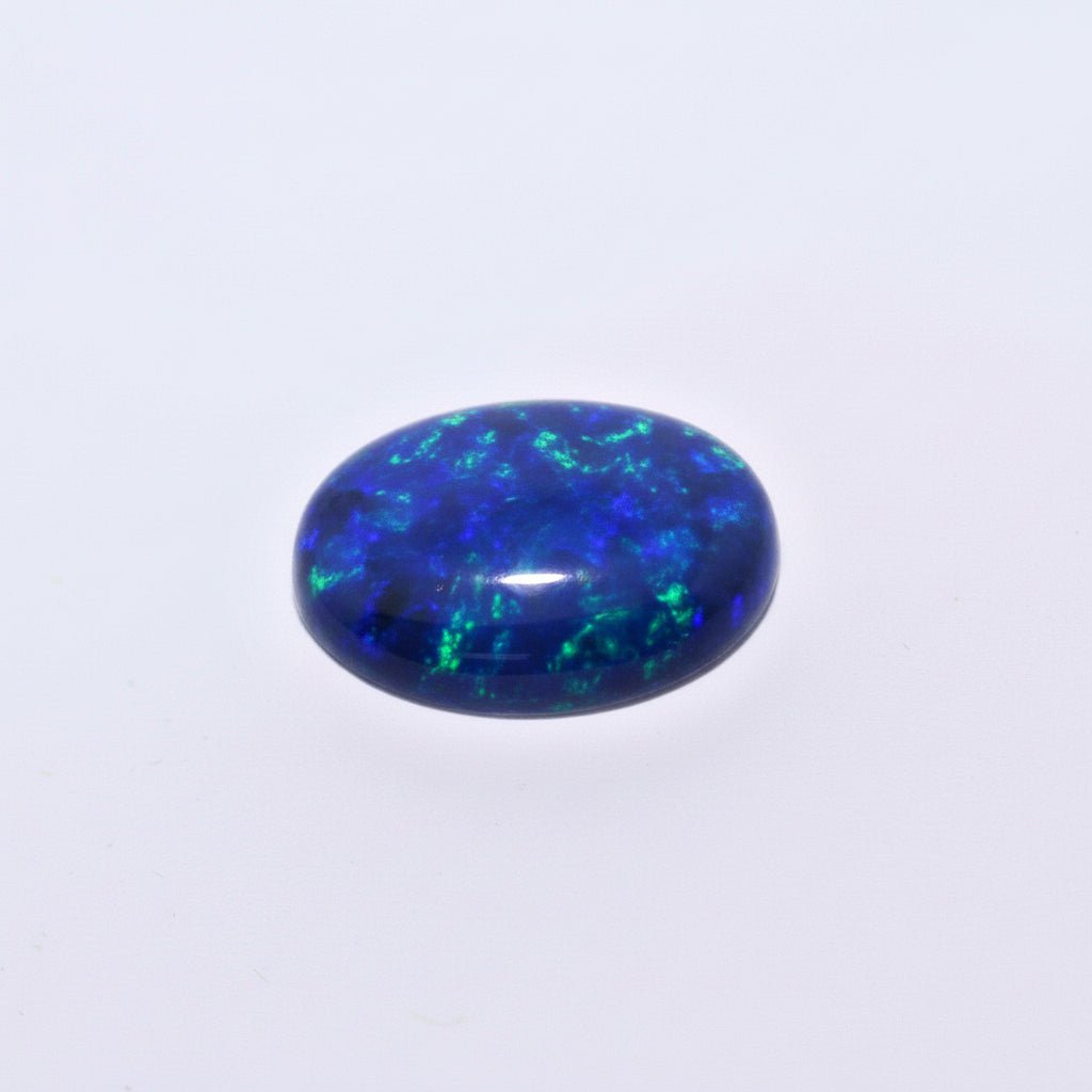 6.03 Carat Black Semi - Crystal Opal Oval Cabochon - Blue Play of Color - Gemstone Portal