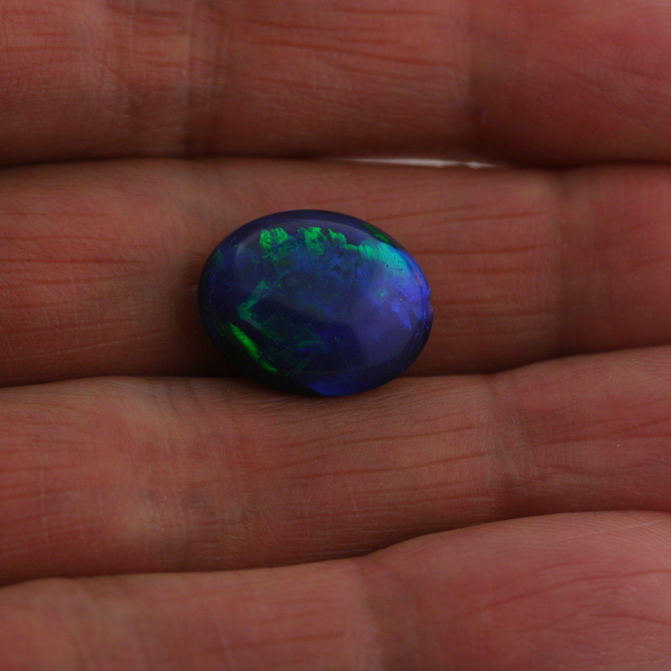 5.49 Carat Black Crystal Opal Oval Cabochon - Green Blue Fire - Gemstone Portal