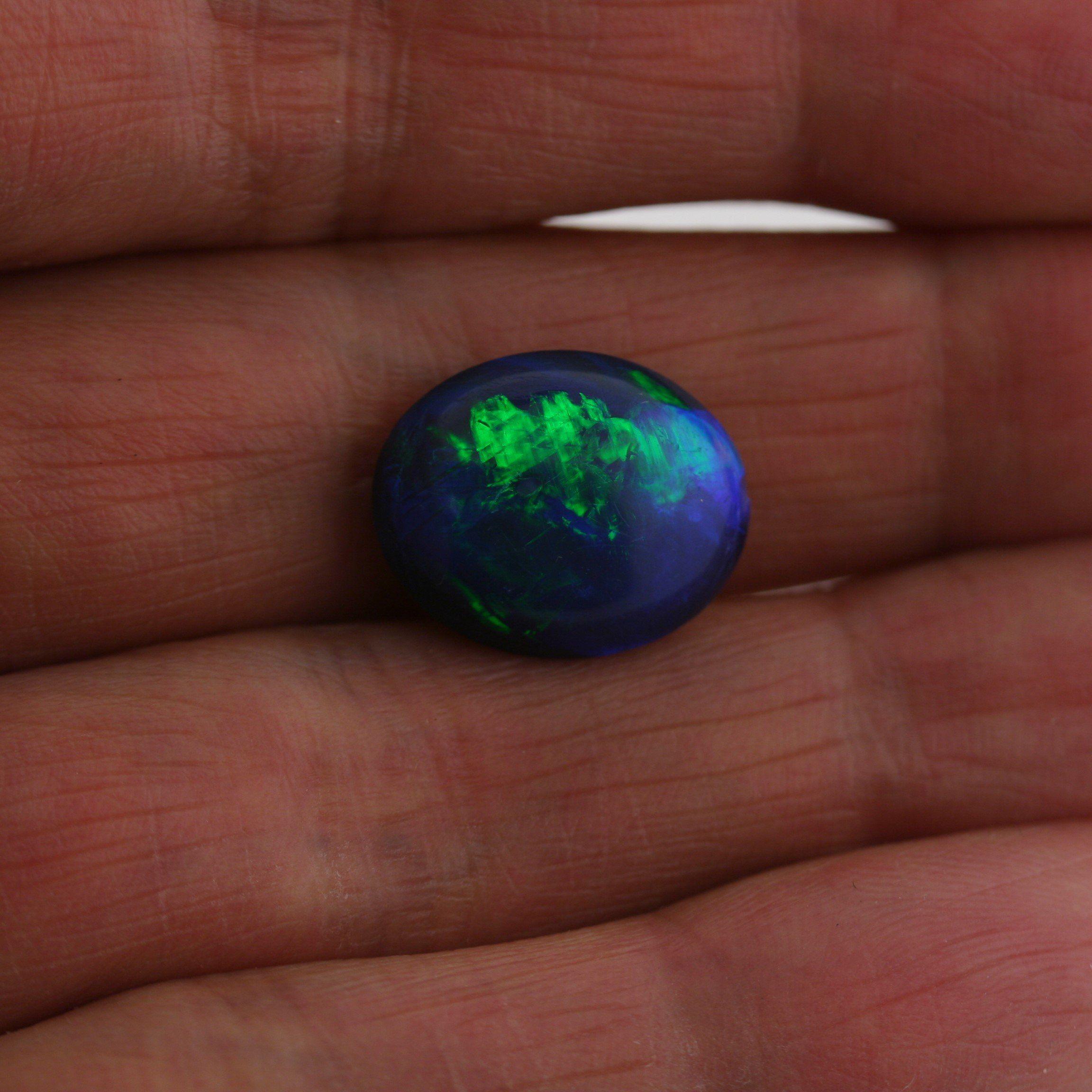 5.49 Carat Black Crystal Opal Oval Cabochon - Green Blue Fire - Gemstone Portal