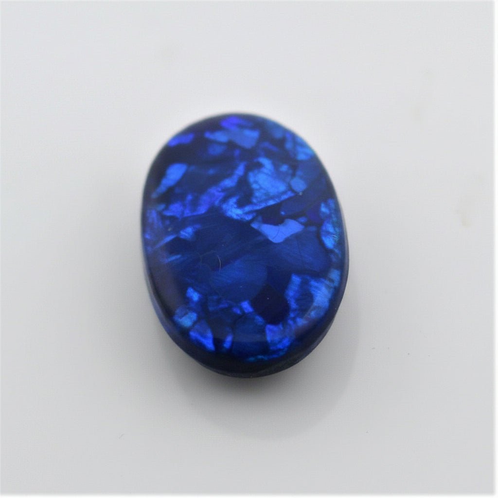 5.44 Carat Black Opal Oval Cabochon - Blue Play of Color - Gemstone Portal