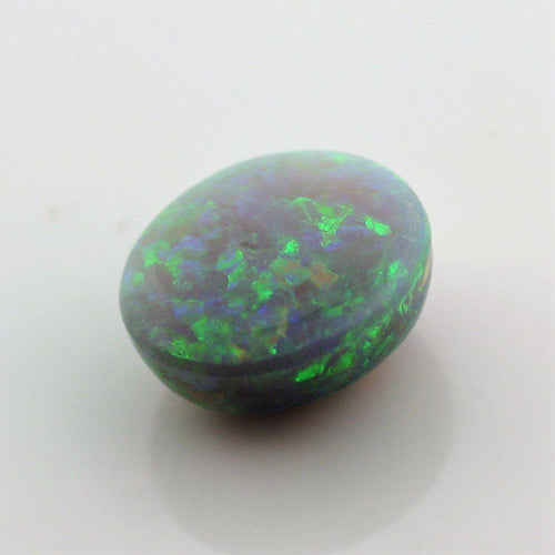 4.67 Carat Dark Opal Cabochon - Green Orange Blue Fire - Gemstone Portal
