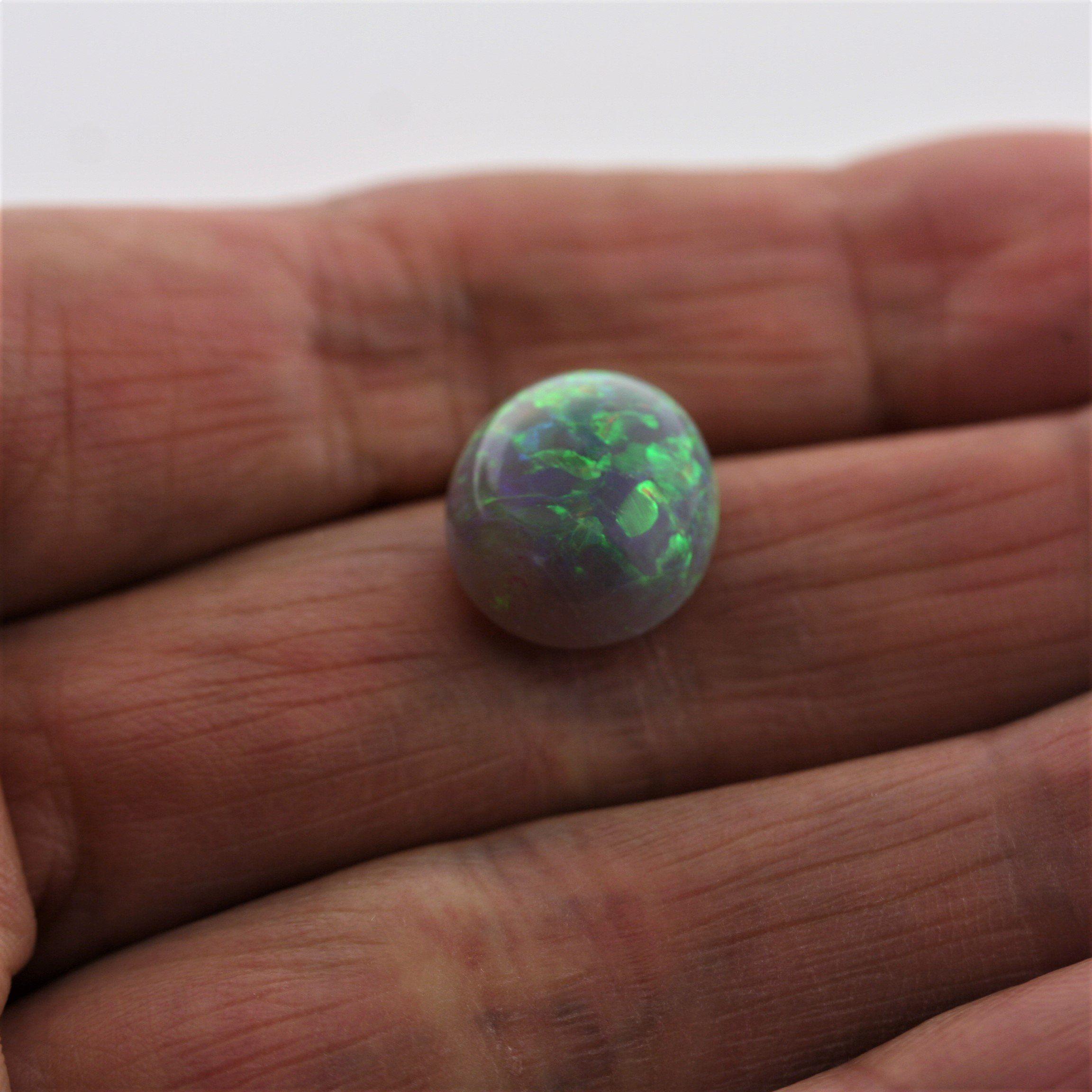 4.67 Carat Dark Opal Cabochon - Green Orange Blue Fire - Gemstone Portal