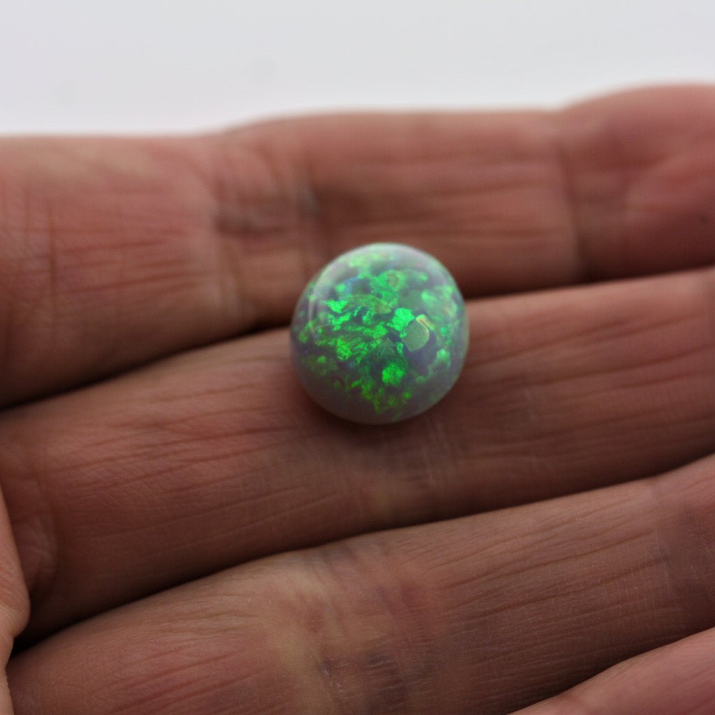 5.38 Carat Australian Dark Opal Cabochon - Orange Green Play of Color - Gemstone Portal