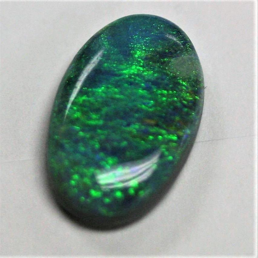 9.40 Carat Black Opal Oval Cabochon - Green Blue Fire - Gemstone Portal